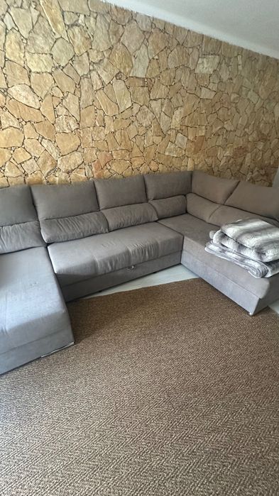 Sofá com chaise long e cama