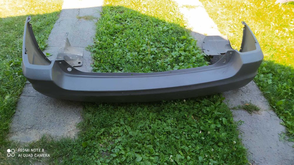 Бампер задній Мазда Трибют
