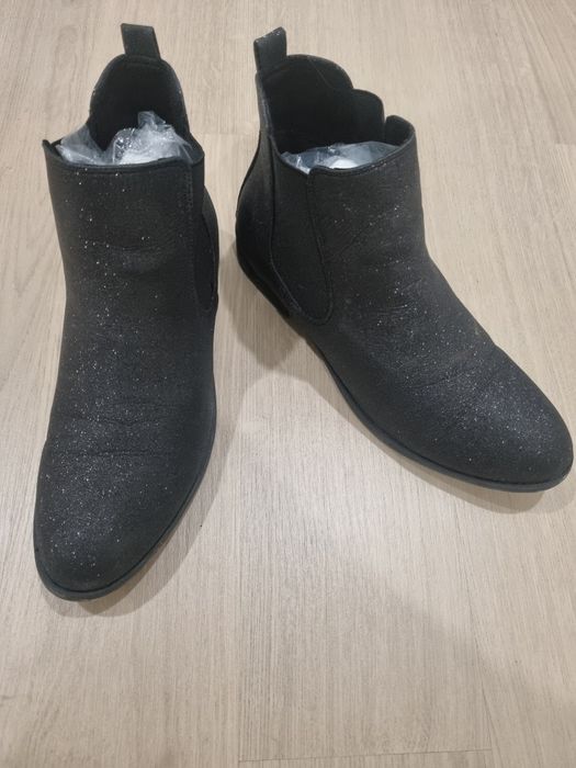 Botins pretos com brilho