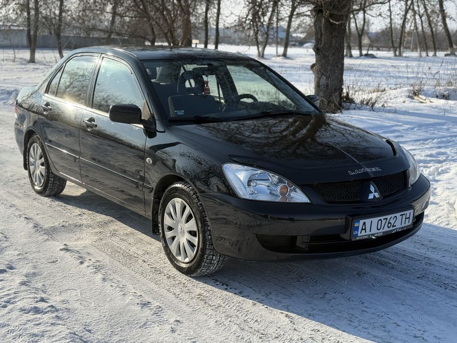 Продам  Mitsubishi Lancer