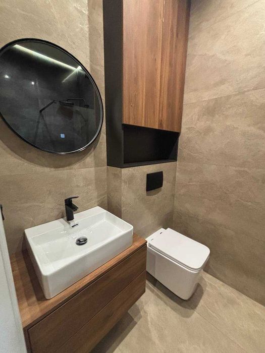 Продам кутовий таунхаус з дизайнерським ремонтом в самому центрі Бучі