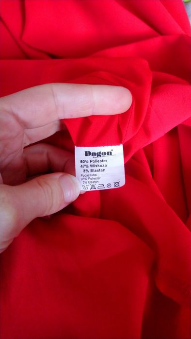 Różowa elegancka sukienka asymetryczny dół