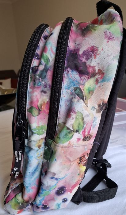 Mochila GUTS como nova