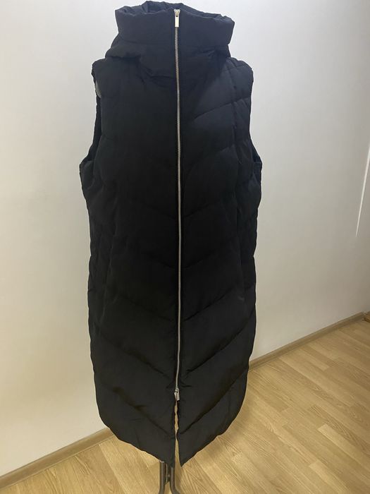 Жіноча жилетка