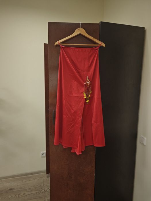 Різноманітні костюми для східних та бальних танців