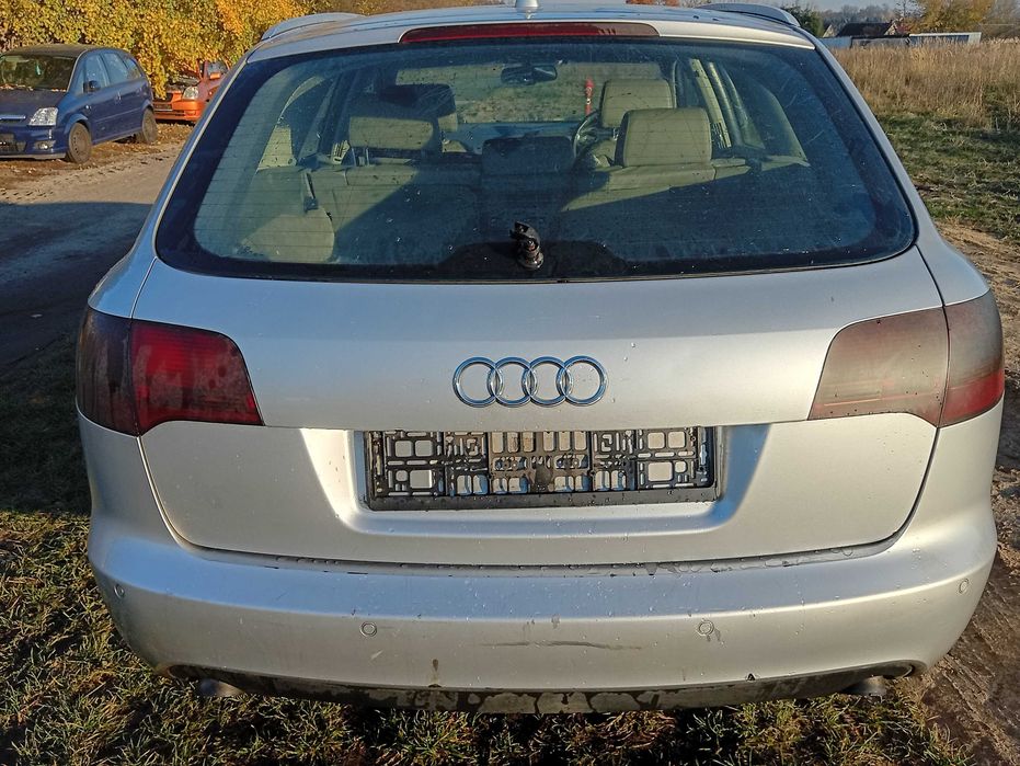 Audi A6 C6 zderak przod srebrny LY7W kpl
