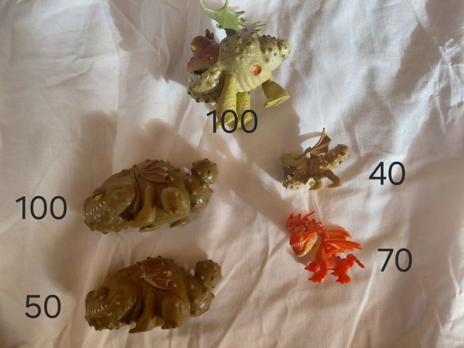 Фигурки драконов из м/ф "как приручить дракона"