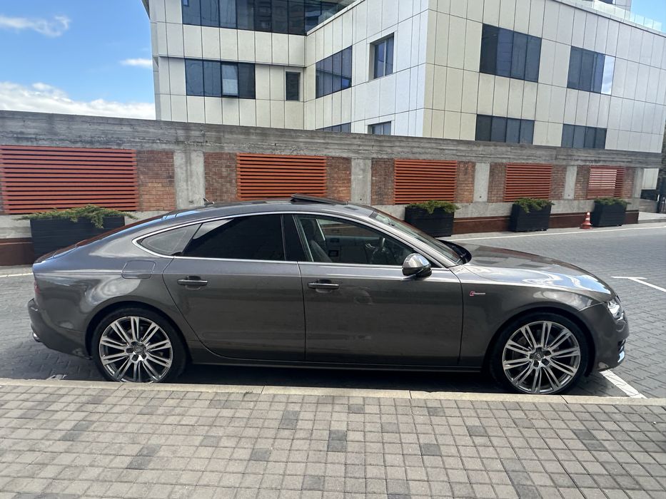 Audi A7 Sportback 2013 VIN WAUWGAFCXEN079939 фото оголошення 2 з 24