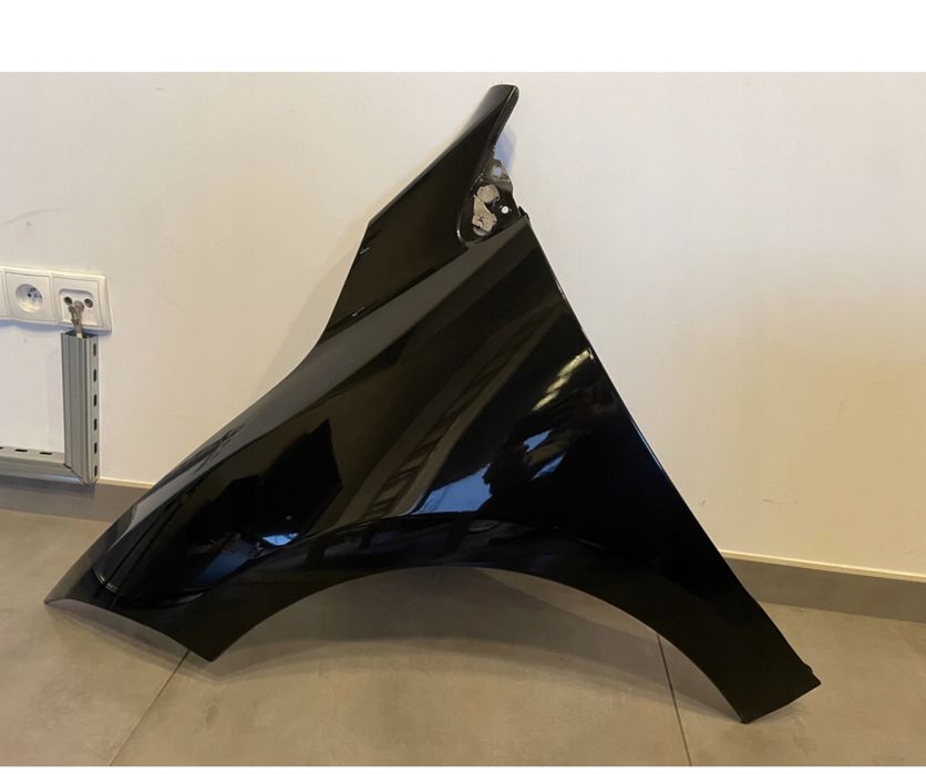 Blotnik lewy czarny renault megane 3 III