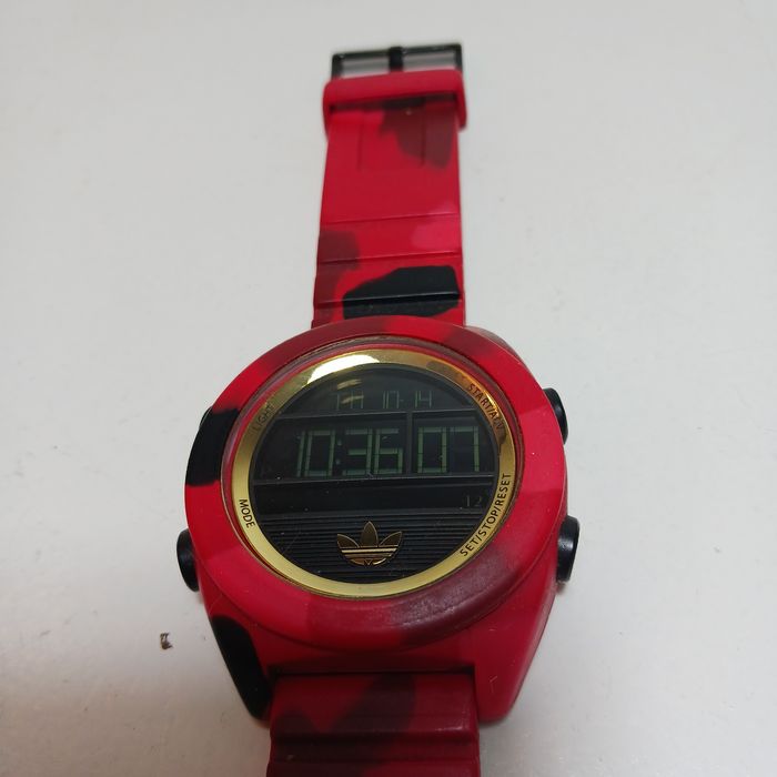 ADIDAS ADH2990 czerwony 
Zegarek męski