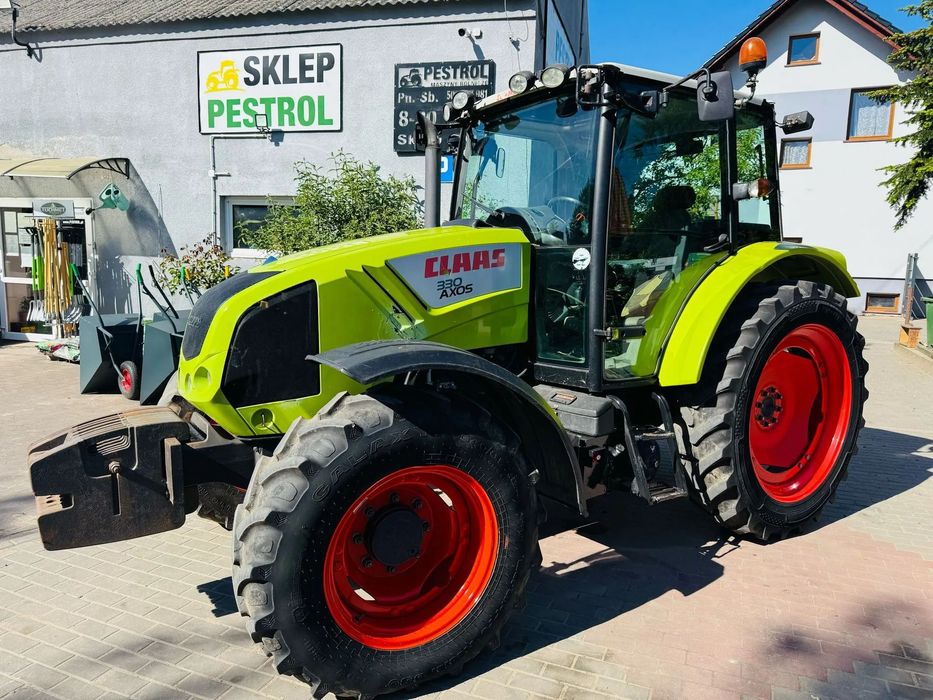 Claas Axos 330  Claas Axos 330, 2014 rok, 4400 cm3 PERKINS 4 cylindry, pneumatyka, 92K