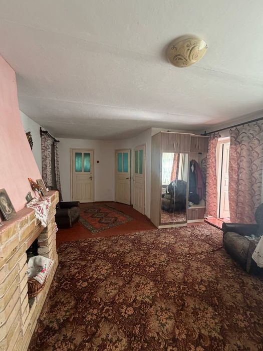 Продам  цегляний 2 поверховий будинок зі зручностями в с. Суйми  .