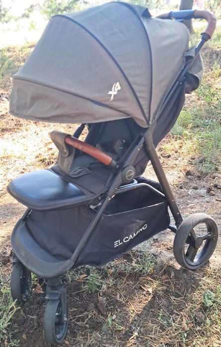 Прогулянкова дитяча коляска