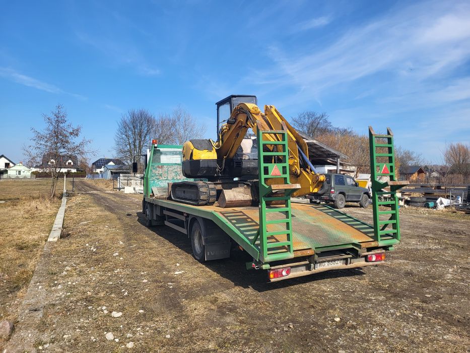 Transport traktorów i mini koparek
