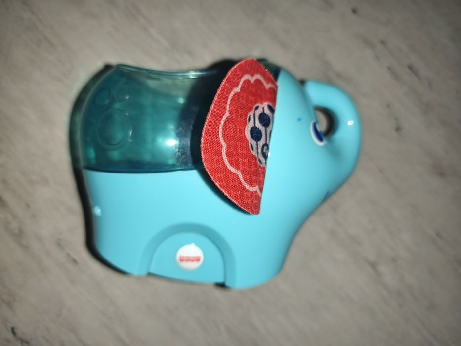 Слоник неваляшка  fisher price