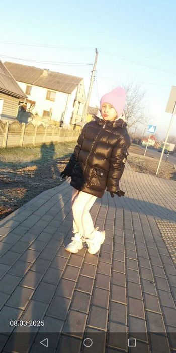 Пуховик на дівчинку 116-122см.