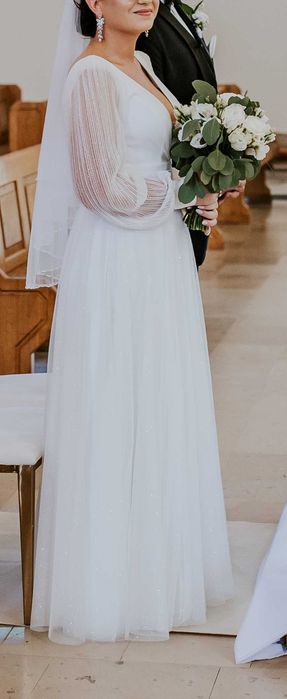 Wyjatkowa suknia ślubna z rekawem