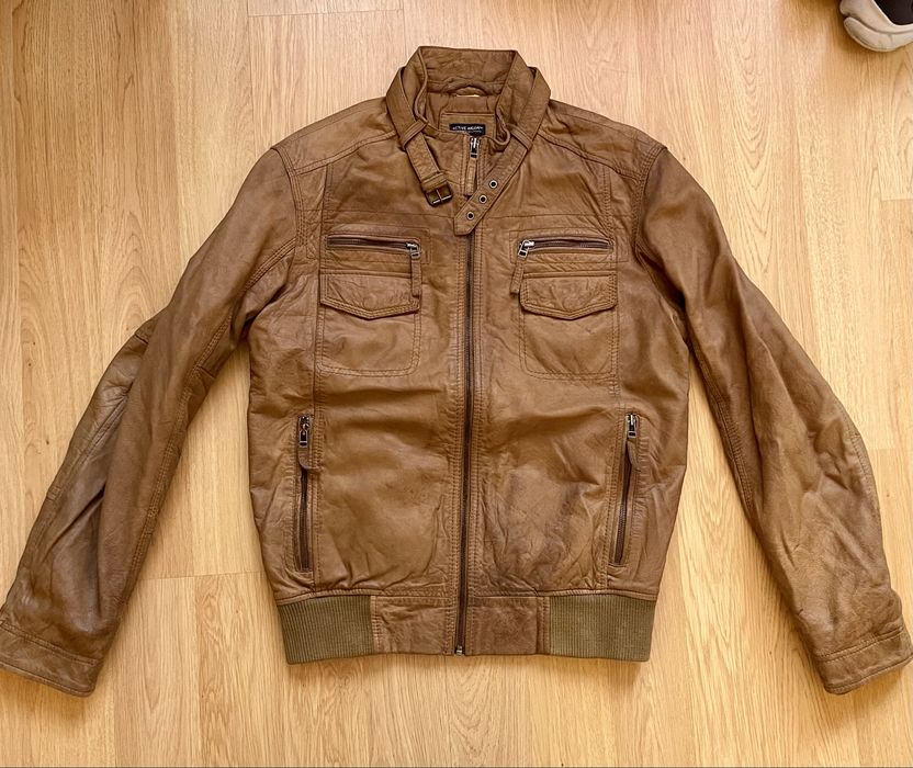 Blusao em pele estilo bomber