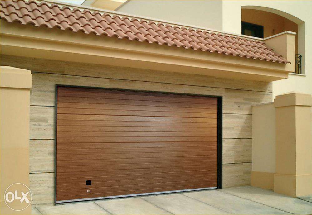 Гаражні ворота Kruzik, захисні роллети.