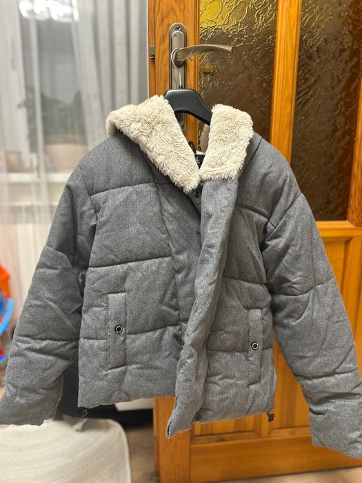 Курточка тепленька в ідеальному стані можна сказати нова