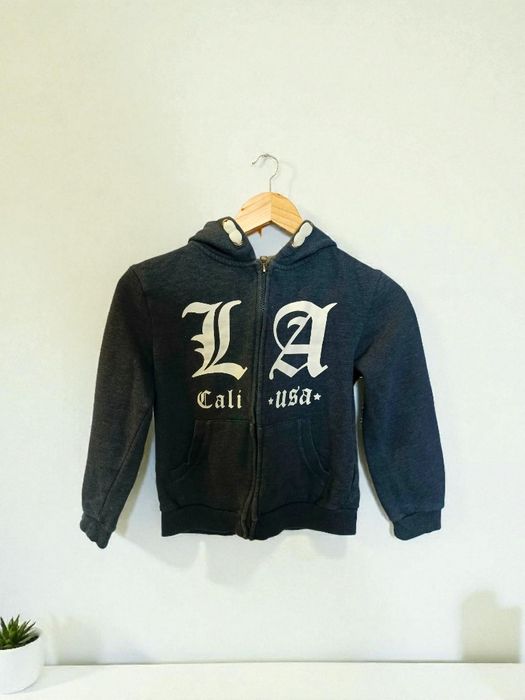 Szara, bawełniana bluza lekko wpadająca w granat, zapinana z kapturem