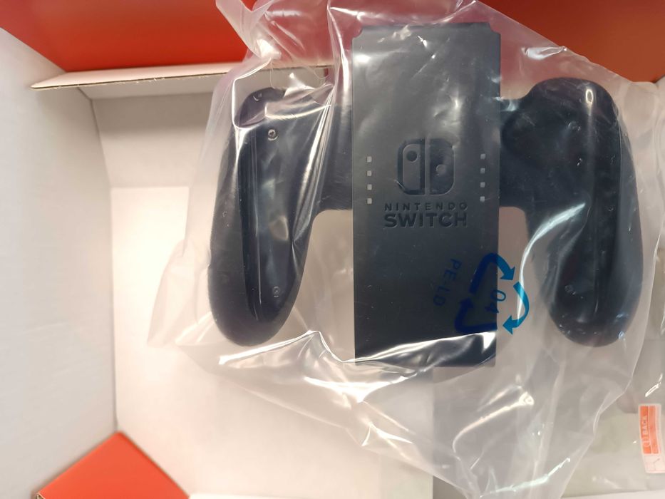 Портативна ігрова приставка Nintendo Switch OLED with Neon Blue and Neon Red Joy-Con (045496453442)