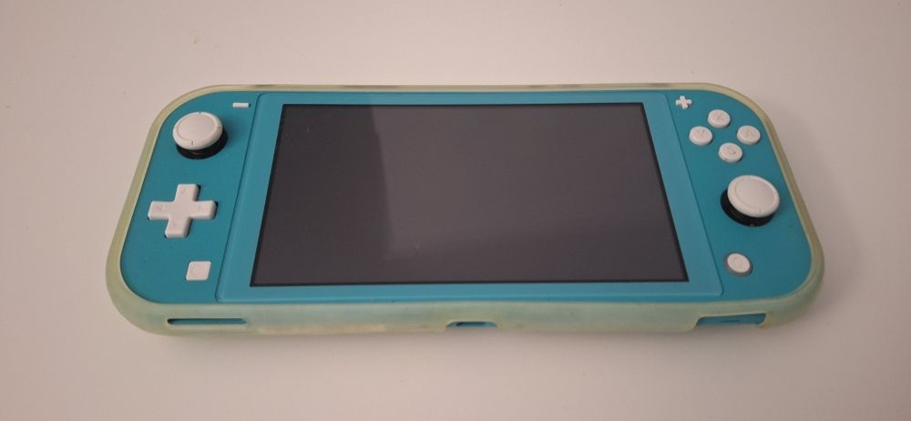 Nintendo Switch Lite azul com bolsa e capa de protecção