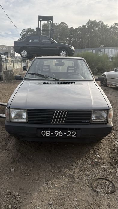 tampa da mala Fiat uno  60 SL ANO 1988