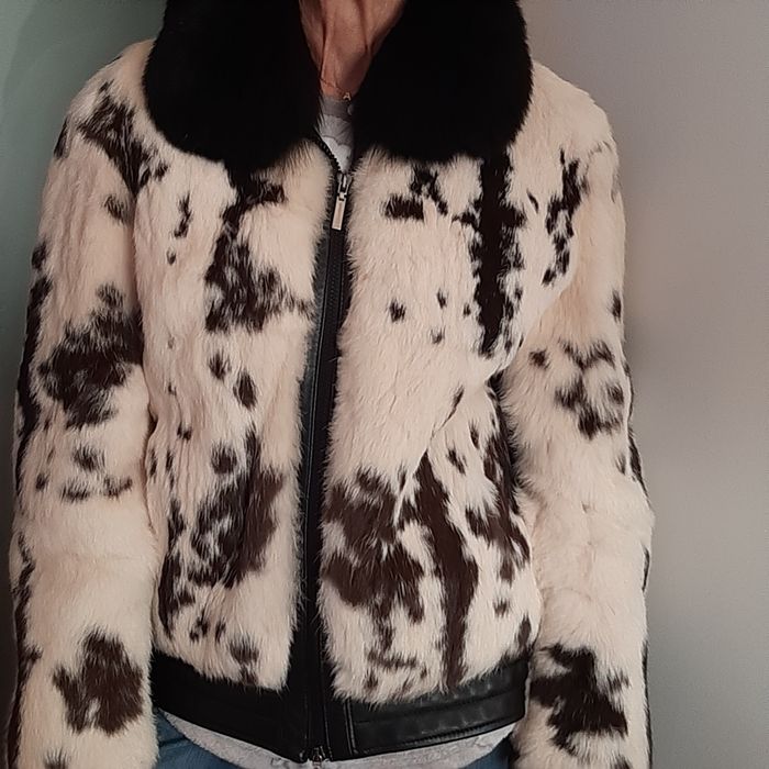 Venda de casaco de pelo natural e cabedal.