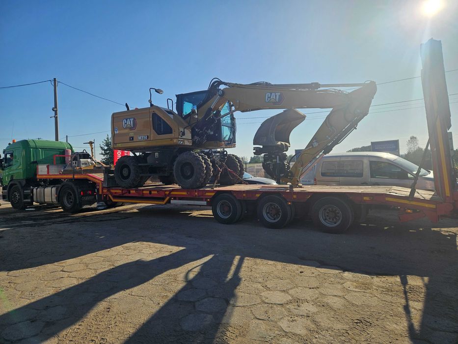 Transport maszyn budowlanych i rolniczych usługi transportowe laweta