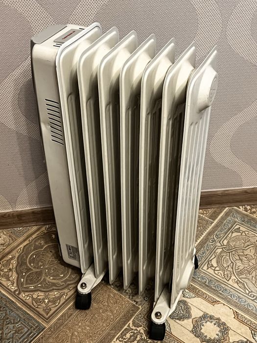 Маслянный обогреватель