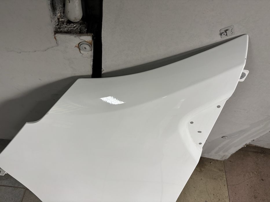 Błotnik lewy Renault Trafic III lift, IV, z mocowaniem