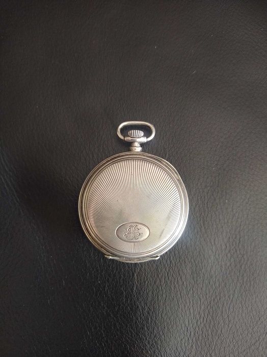 Antigo relogio de bolso Movado, em prata. Trabalha muito bem