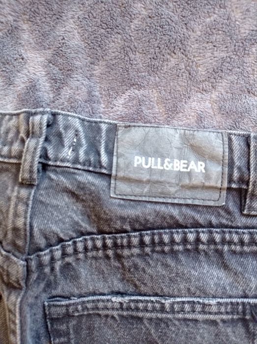 Dżinsy z dziurami XS