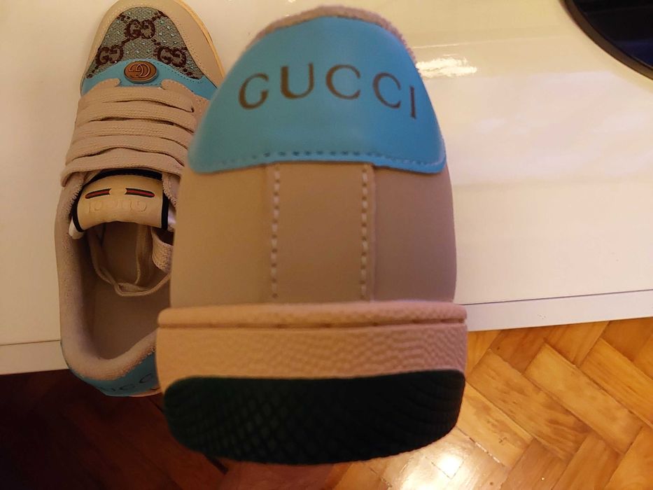 Sapatilhas Gucci.