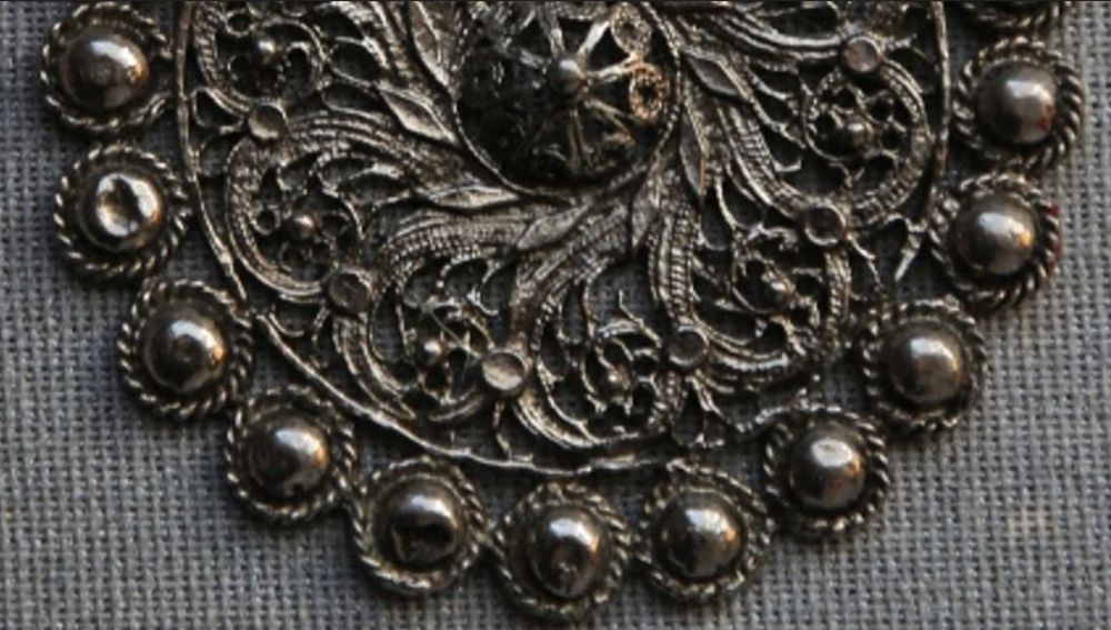 Medalhão prateado