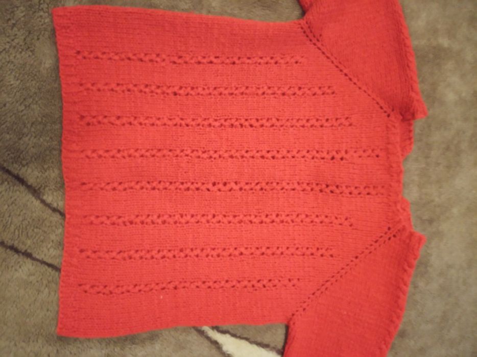 В'язана кофтинка