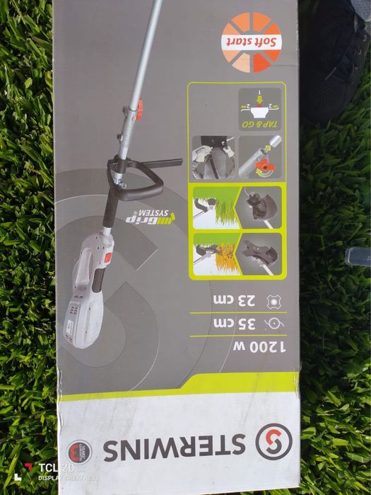 Máquina de fio para aparar os cantos da relva