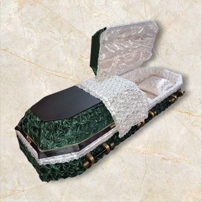 Труни, гроби, домовини, ритуальні послуги.