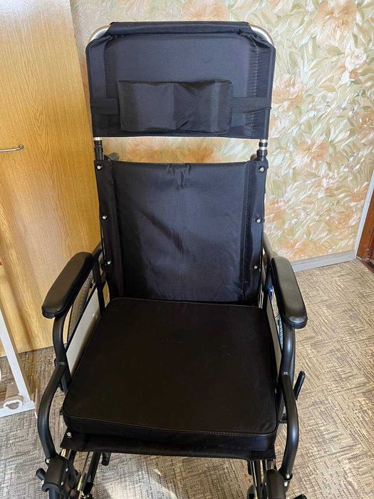 Новая инвалидная коляска.