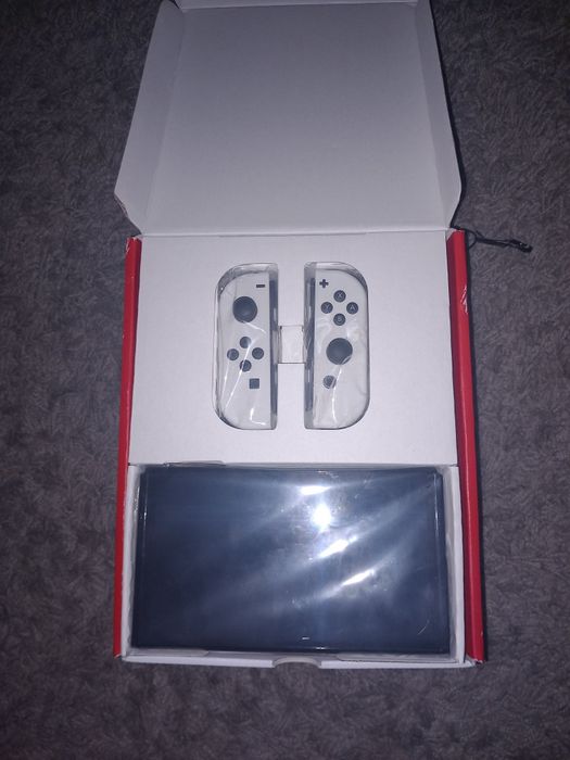 Nintendo switch oled branca completa com caixa e capa nova (opcional)