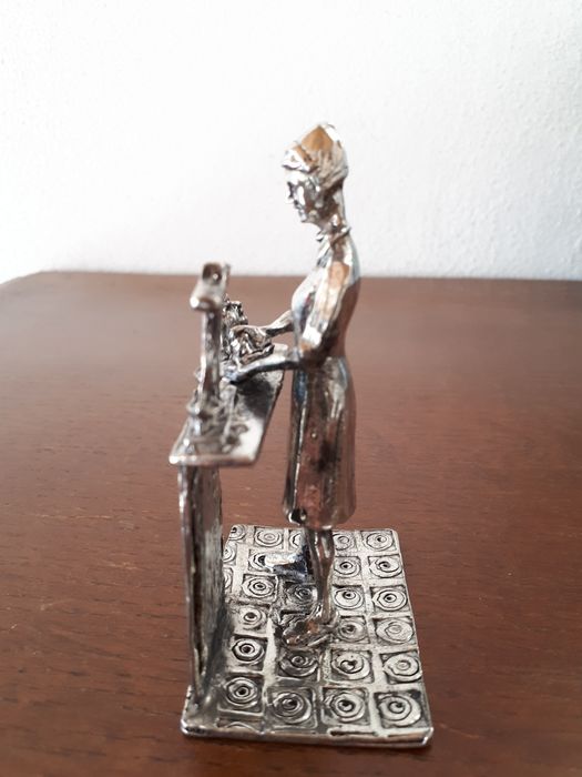 Boneco de estanho 95% Farmacêutica