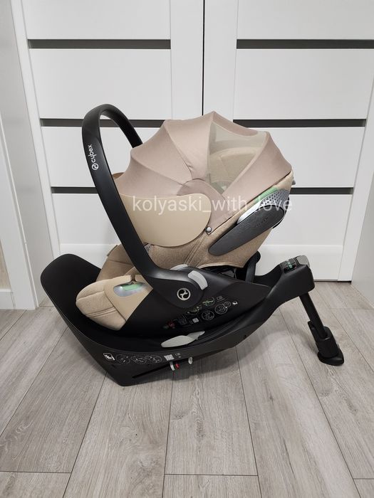 Розкладне автокрісло Cybex Cloud T plus i-size Cozy beige Сайбекс бежеве