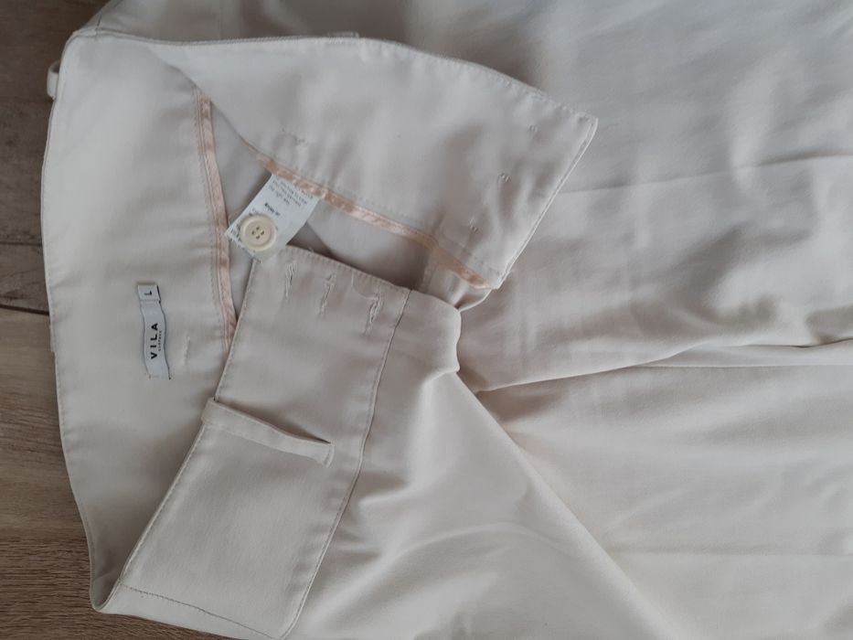 Spodnie kremowe eleganckie