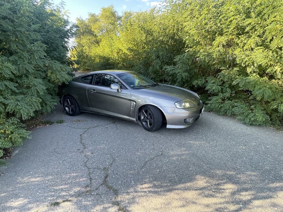Hyundai Coupe 2006 VIN KMHHN61FP6U213796 фото оголошення 13 з 19
