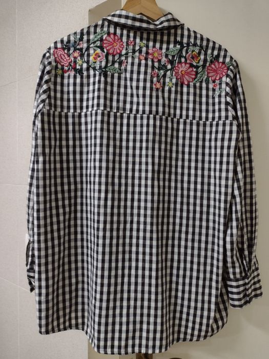 Camisa Pimkie M

Preta e Branca com Padrão floral.

Em excelente estad