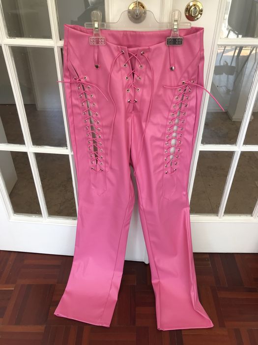 Calças em pele rosa com cordões (38/M)
