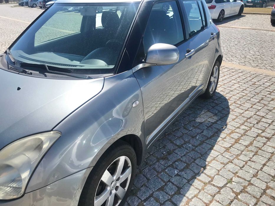 Suzuki Swift 1.3 gasolina — photo 2