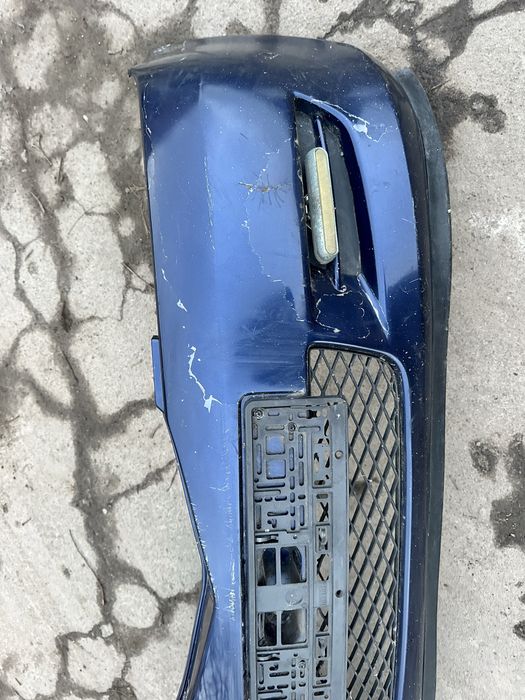 Передній бампер Mazda 2  Мазда 2 2003-2007