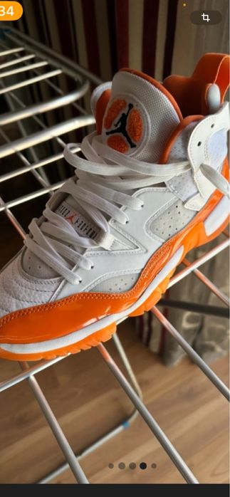 Jordan 14 branco e laranja